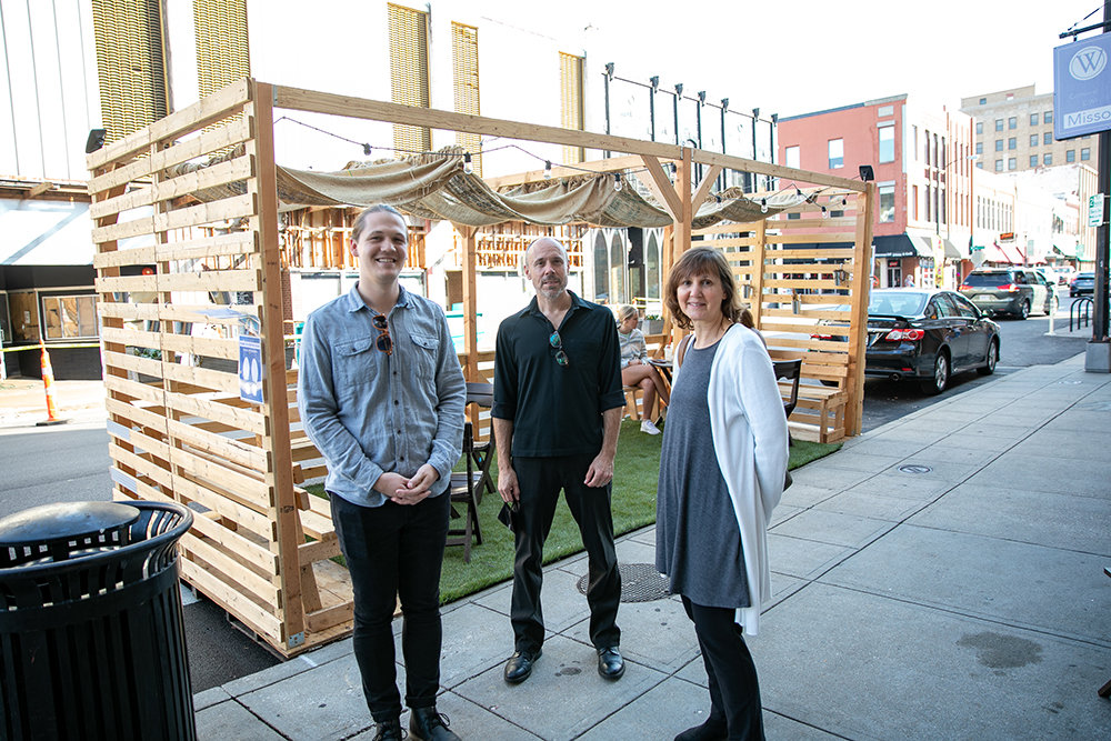 ON THE BLOCK: From left, Addison Jones, David Derossett and Karen Spence of Better Block SGF say installations such as the one in front of Mudhouse Coffee creatively reimagine outdoor spaces in town.